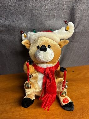GEMMY Plush Reindeer with Red Scarf and Jingle Bells Song and Light work